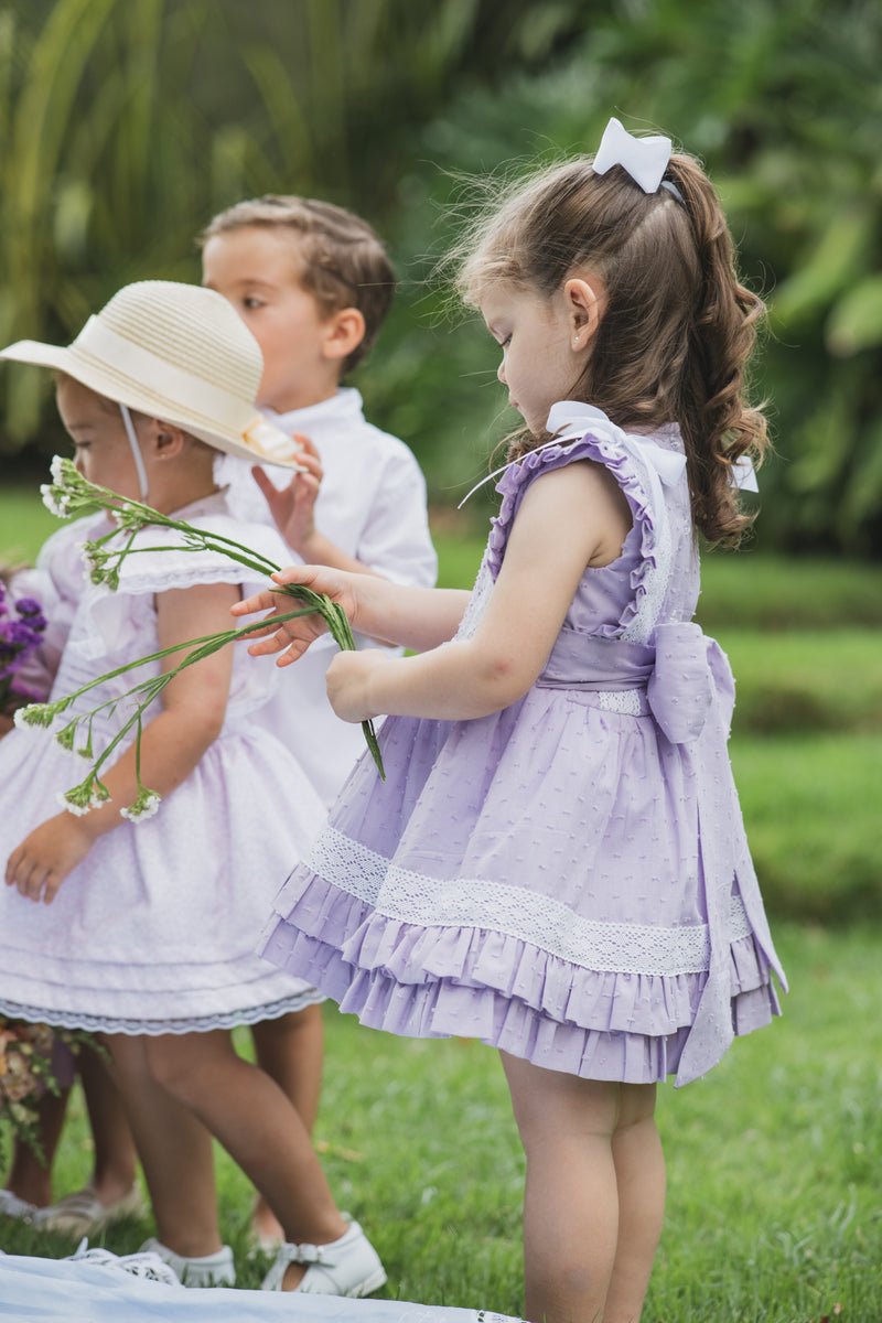  Sault Dress - Lilac plumeti dress with round neckline, pleats, ruffles, and white lace trim | Bee•nené